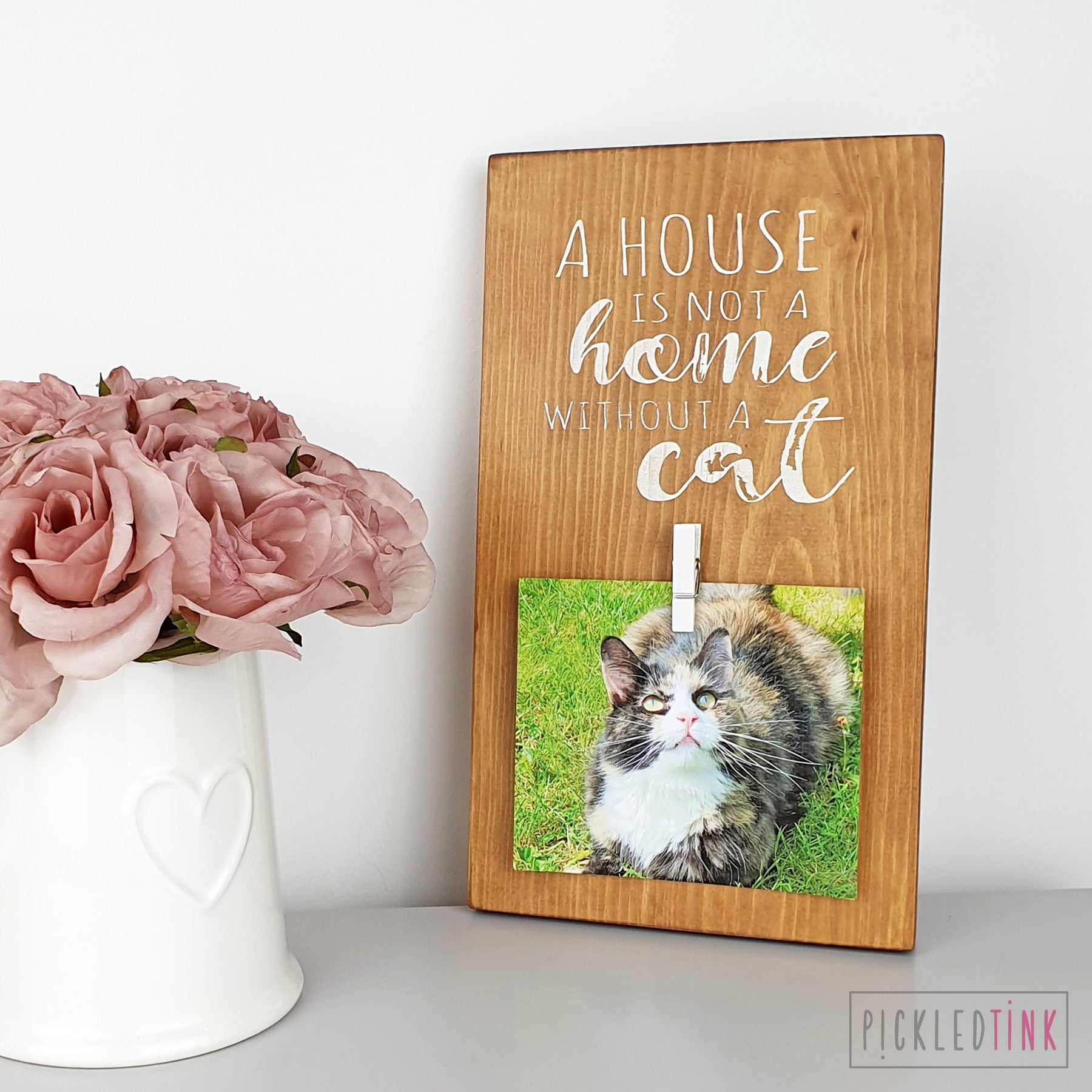 A house is not a home without a cat - Peg Photo Frame