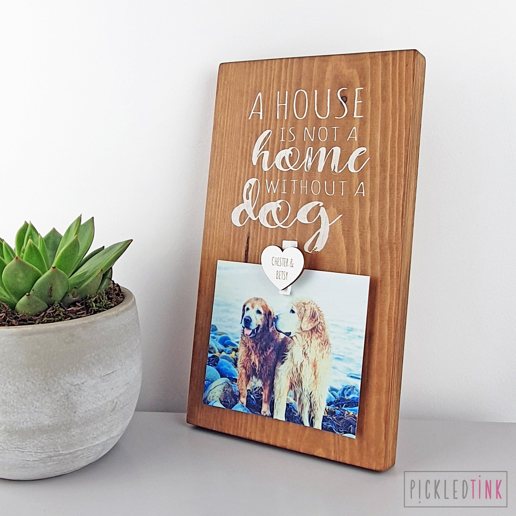 A house is not a home without a dog - Peg Photo Frame