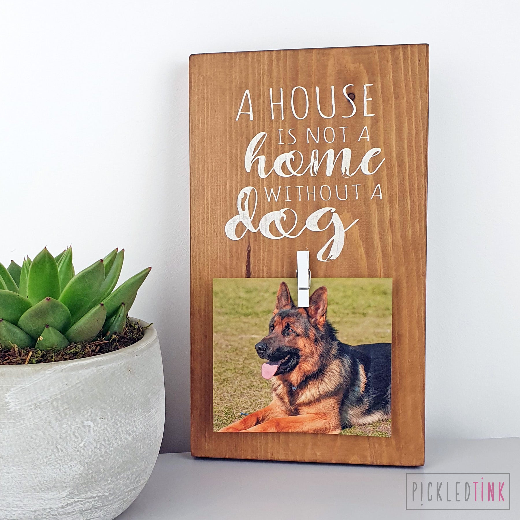 A house is not a home without a dog - Peg Photo Frame