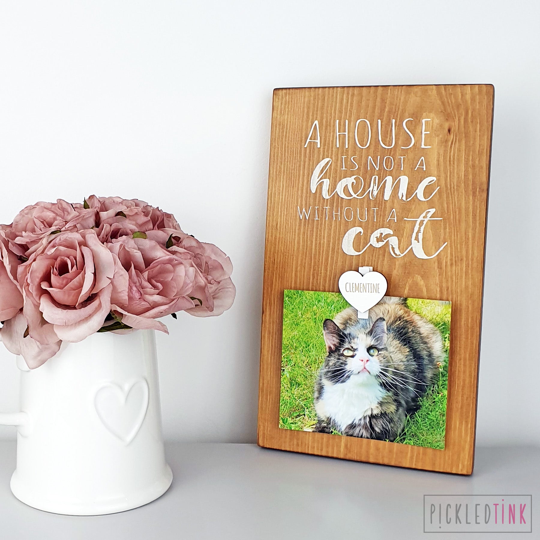 A house is not a home without a cat - Peg Photo Frame